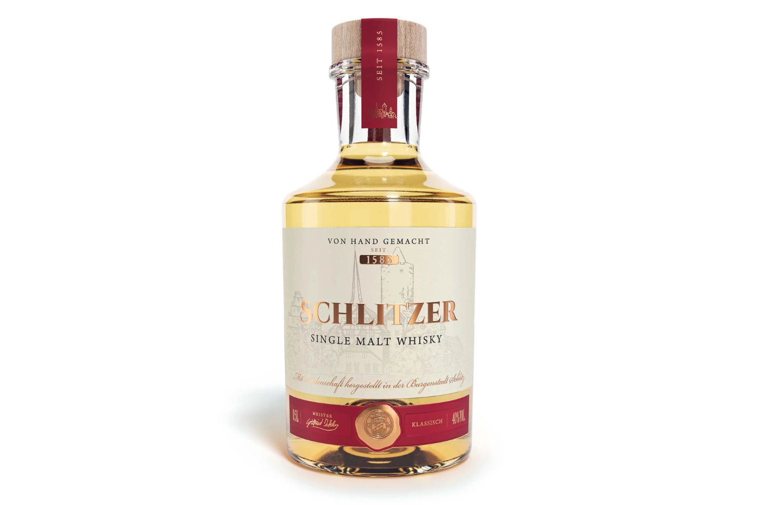 Flasche "Schlitzer Single Malt Whisky", 700 ml, 40% Vol., mit weißem Etikett und rotem Aufdruck auf hellem Hintergrund.