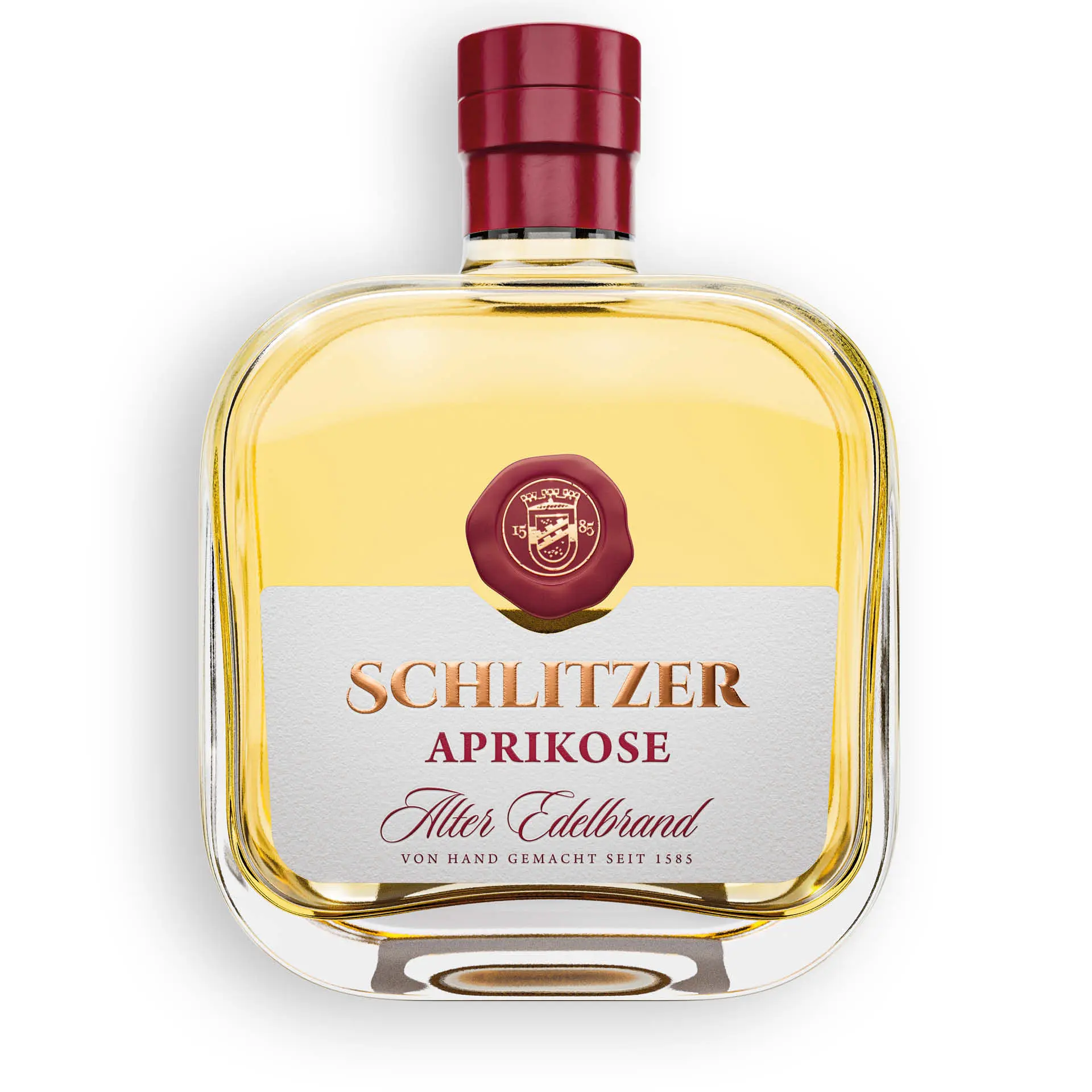 Alter Aprikosen-Brand aus dem Akazienholzfass – Edler Obstbrand der Schlitzer Destillerie Flasche Schlitzer Alter Aprikosen-Brand im Akazienholzfass, vor weißem Hintergrund, edles Etikett mit goldener Schrift, hochwertiger Obstbrand der Schlitzer Destillerie.