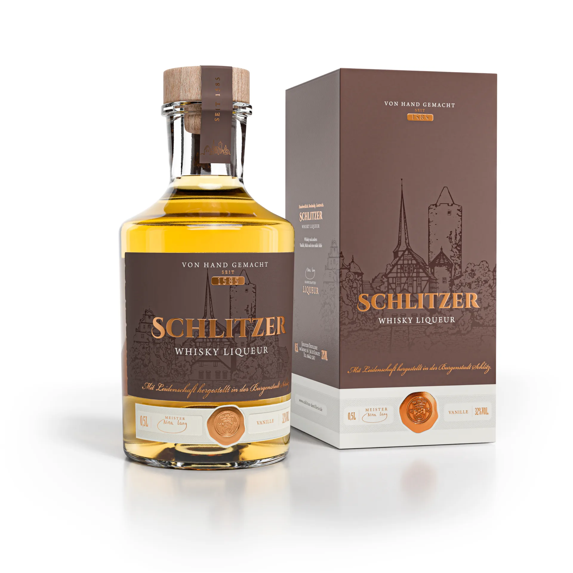 Schlitzer Whisky Likör im Geschenkkarton – Edler Likör in hochwertiger Geschenkverpackung Geschenkverpackter Schlitzer Whisky Liqueur – edle 0,5-l-Flasche mit braun-goldenem Etikett in stilvollem Geschenkkarton, hochwertige Spirituose aus der Schlitzer Destillerie.