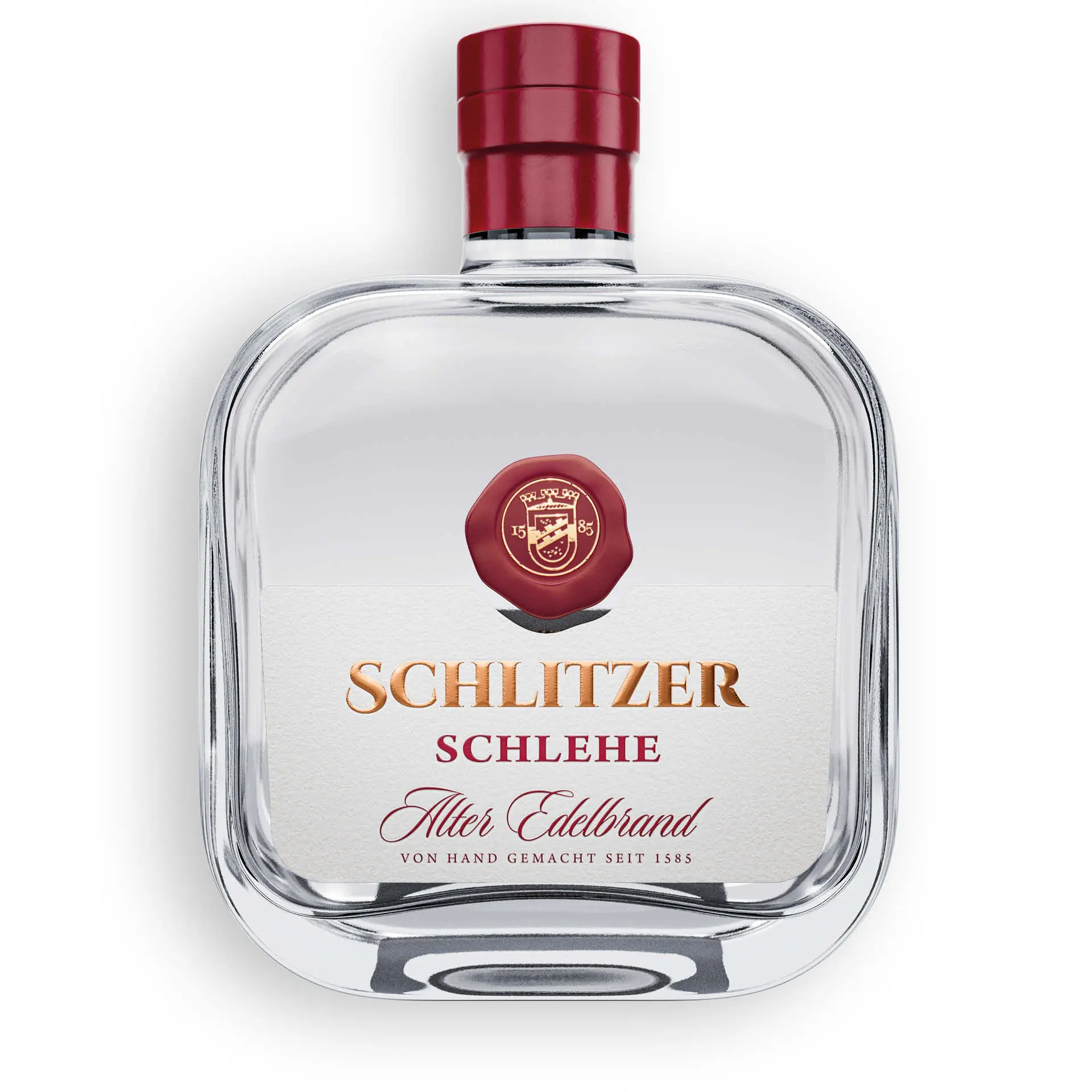 Alter Schlehenbrand in eleganter Flasche vor neutralem Hintergrund – Edler Obstbrand aus der Schlitzer Destillerie Flasche Alter Schlehen Brand von der Schlitzer Destillerie mit goldfarbenem Etikett und schwarzem Verschluss vor neutralem Hintergrund.