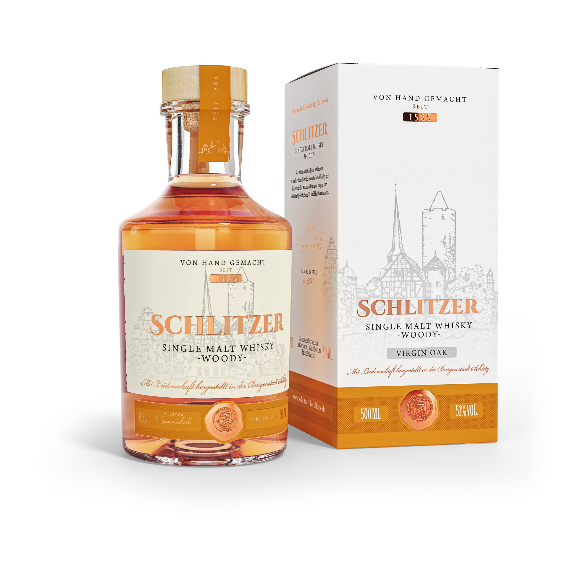 Schlitzer Single Malt Whisky Woody in edler Geschenkverpackung – hochwertiger deutscher Whisky kaufen Geschenkverpackung des Schlitzer Single Malt Whisky Woody – edle schwarze Box mit goldener Schrift und Flasche mit bernsteinfarbenem Whisky, hochwertiges Design für Genießer und Whisky-Liebhaber.