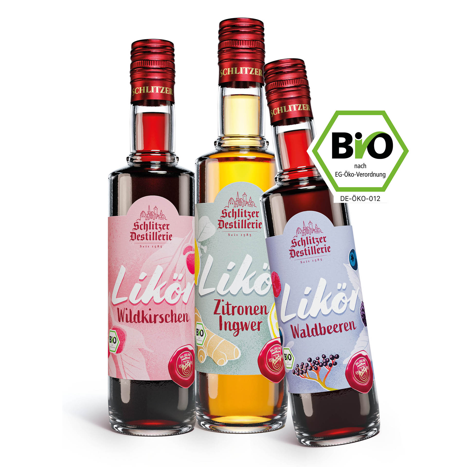 Set aus Bio-Likören der Schlitzer Destillerie – Hochwertige Spirituosen in ansprechender Geschenkbox Bio-Likör Set von Schlitzer Destillerie in stilvollen Flaschen vor weißem Hintergrund - ideal für Genießer von Bio-Spirituosen.