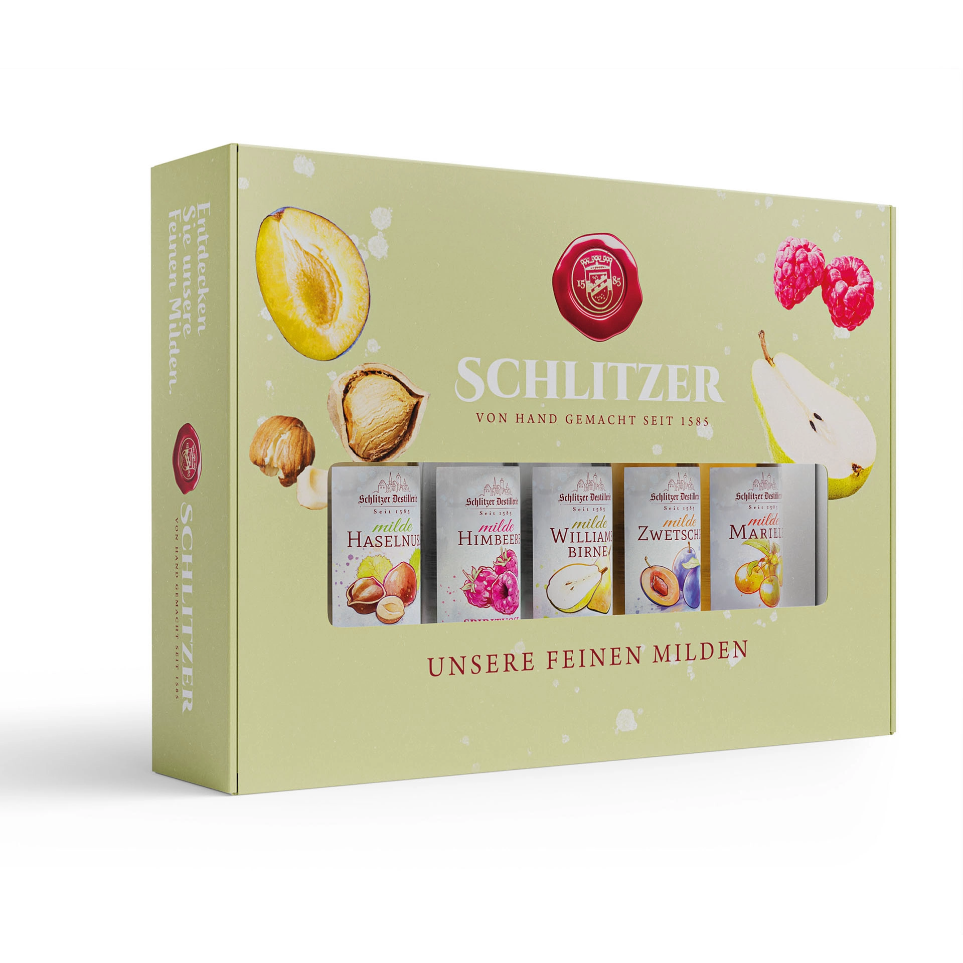 Milde Probierstube Geschenkbox – Exklusive Spirituosen-Tasting-Box der Schlitzer Destillerie Geschenkbox „Milde Probierstube“ der Schlitzer Destillerie mit vier klaren Spirituosen in kleinen Flaschen, stilvoll präsentiert in schwarzer Verpackung mit goldener Beschriftung und Blick auf Etiketten der Sorten.